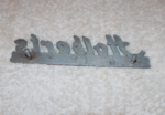 vintage Holbert’s dealership emblem