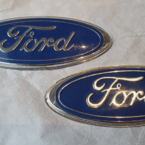 2x Genuine NEW NOS badge emblems